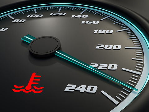 An engine warning light on the dashboard indicates the engine is overheating.